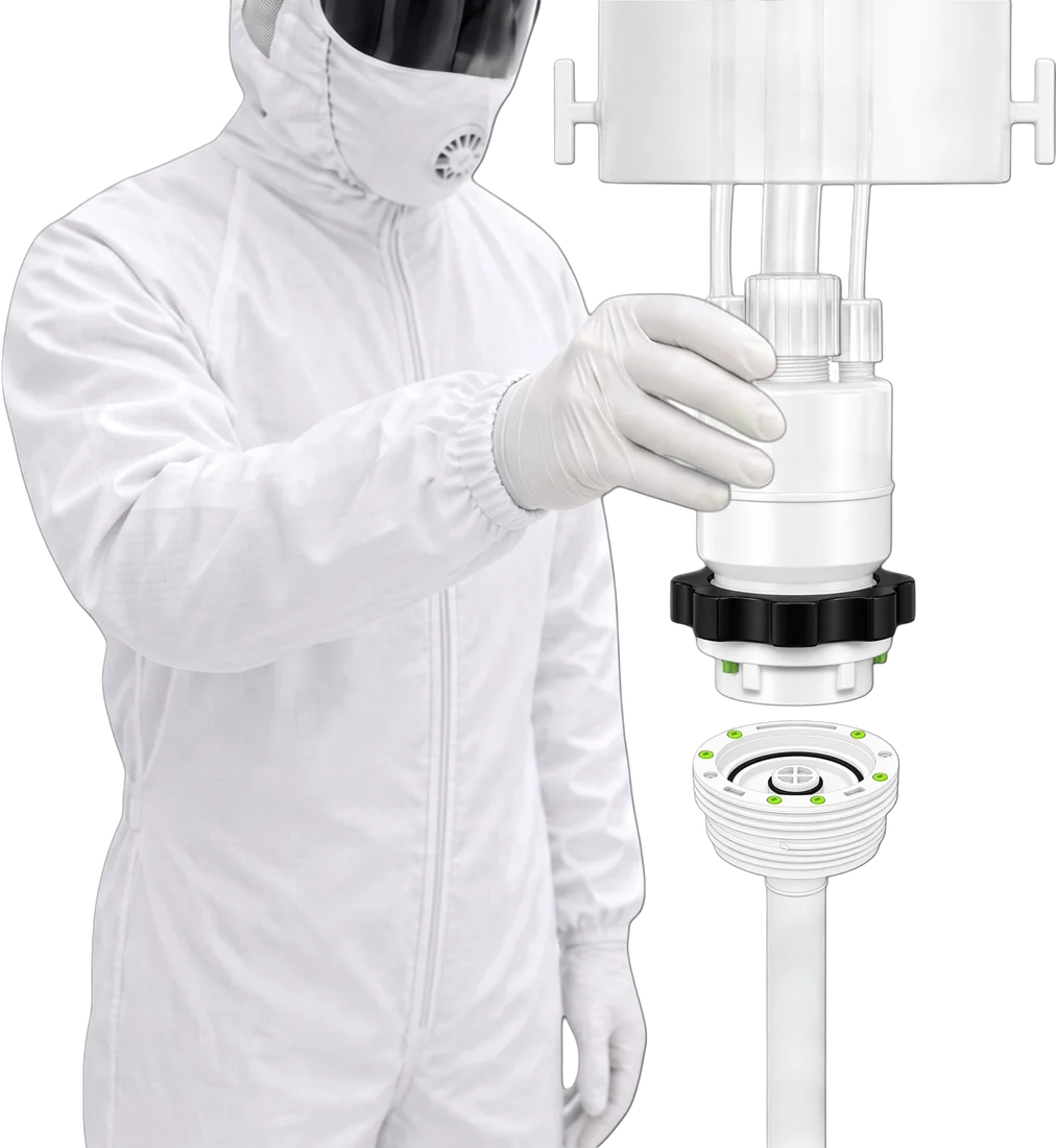 Cleanroom operator holding a KoLink Dispense Head above a Keyed Diptube Insert, codes matched